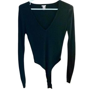 Victoria Secret black sparkle body suit.  No tags but never worn.